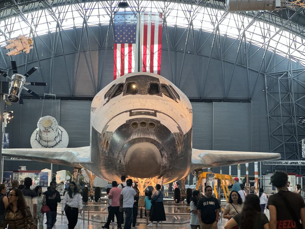 Head on view of a space shuttle.